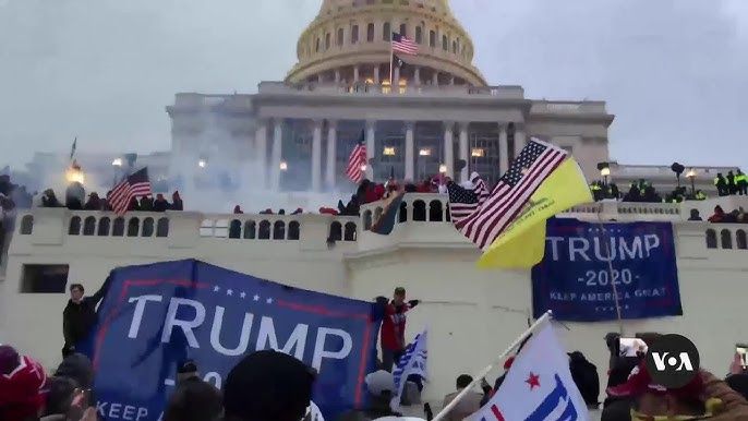 January 6th insurrectionists and traitors attacking our capitol in defense of rapist pedophile, Donald Trump 