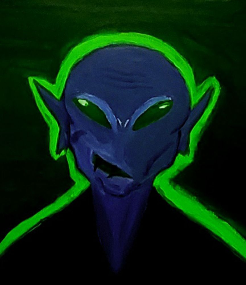 An adorable alien smiling at you.
