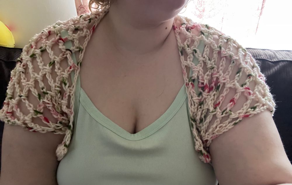 a bolero that ive been working on. i’m extending the back to turn it into a big cape:)