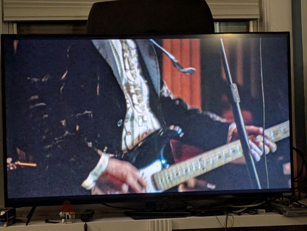 Shot of Clapton's strap breaking 