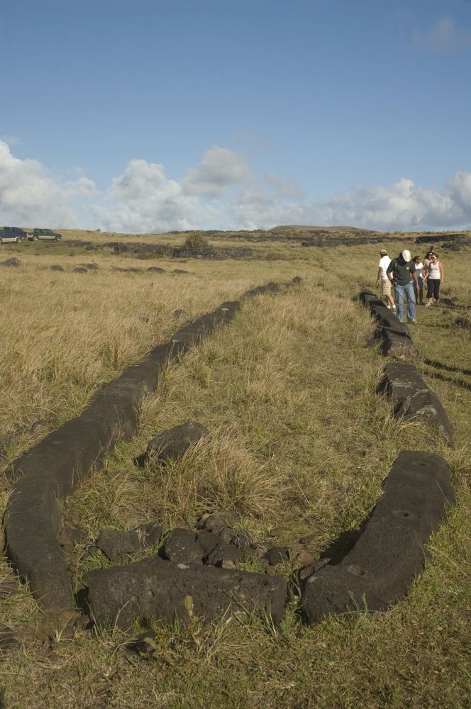Basalt stone foundation and brown grass
