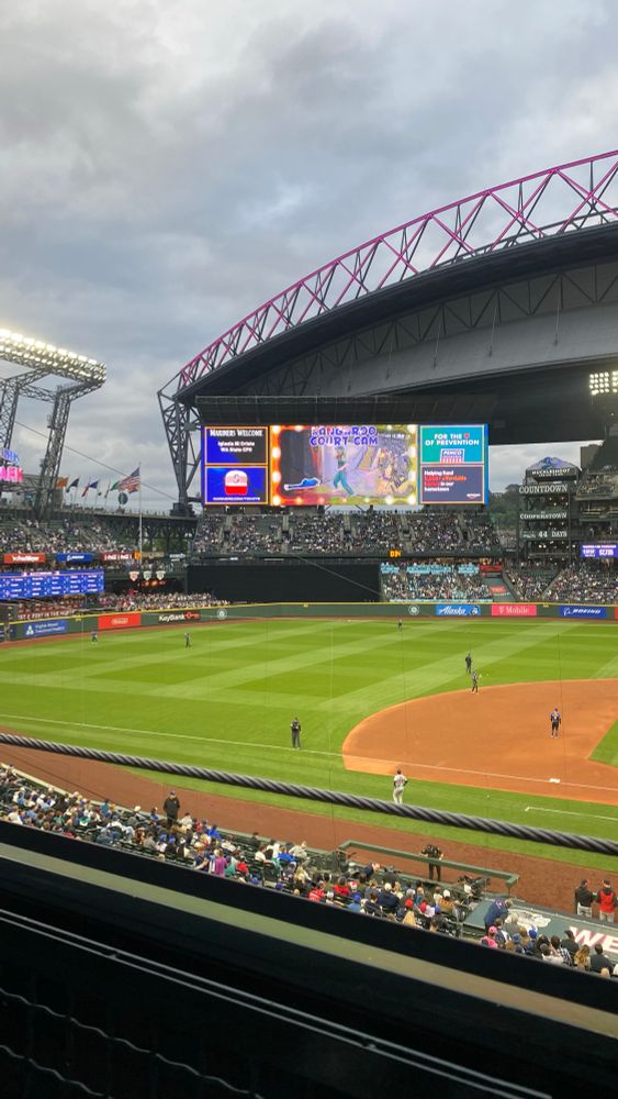 A woman on the jumbo tron dancing mocking the Australian dancer