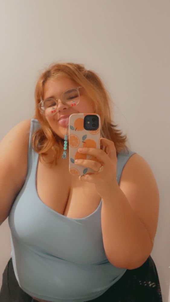 Mirror selfie of me with a cherry filter on my cheeks