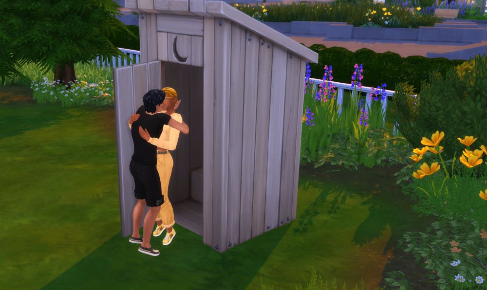 a screenshot of The Sims 4. a male sim dressed in black with black hair kisses a female sim dressed in all yellow. they stand in the open door of a wooden outhouse.