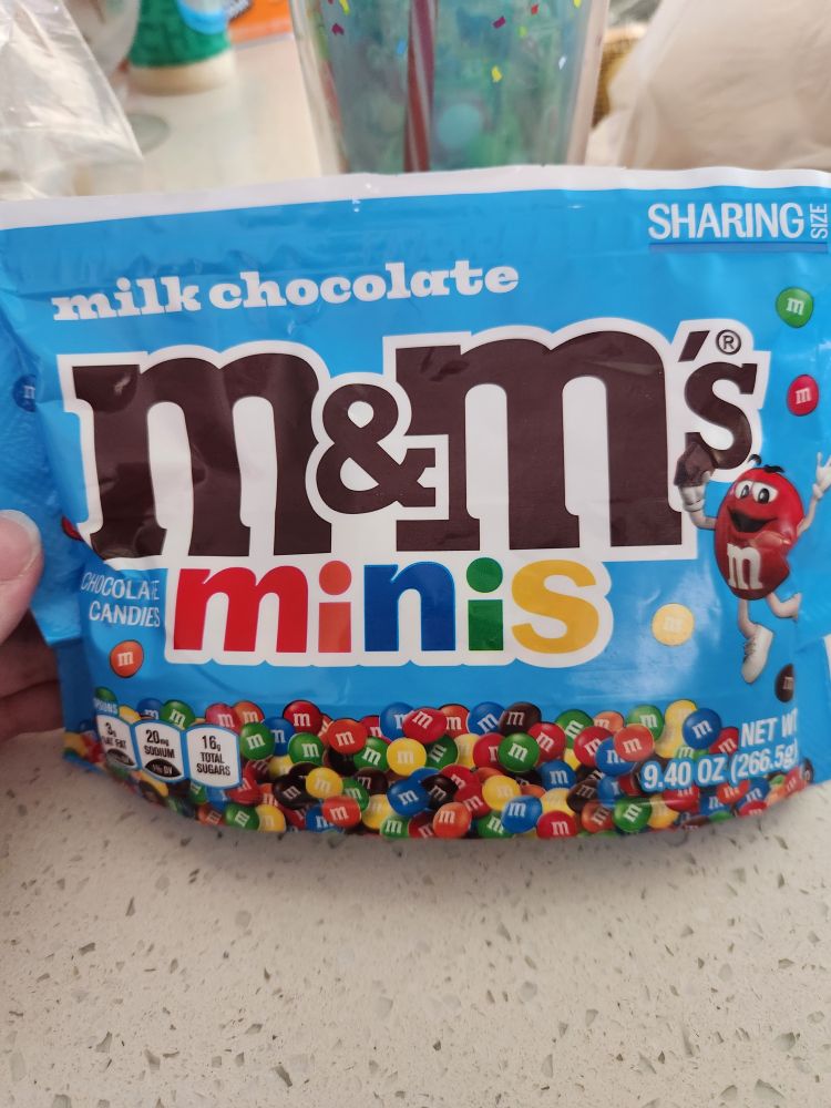 A blue "sharing size" bag of m&m minis. 