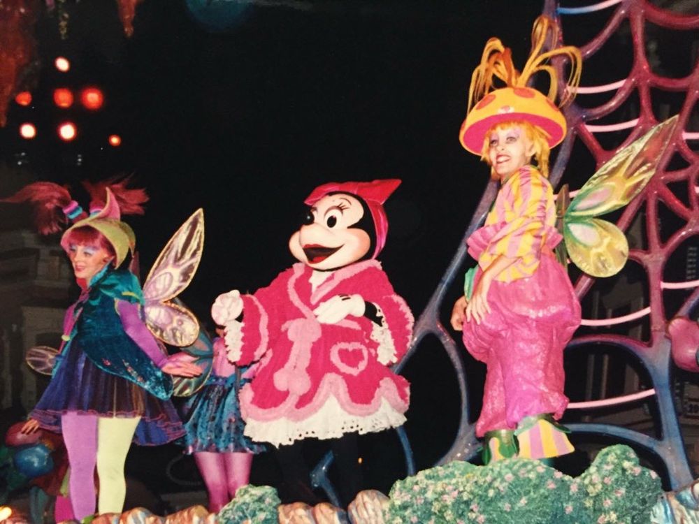 Nighttime photograph of Minnie Mouse and Light Magic performers.