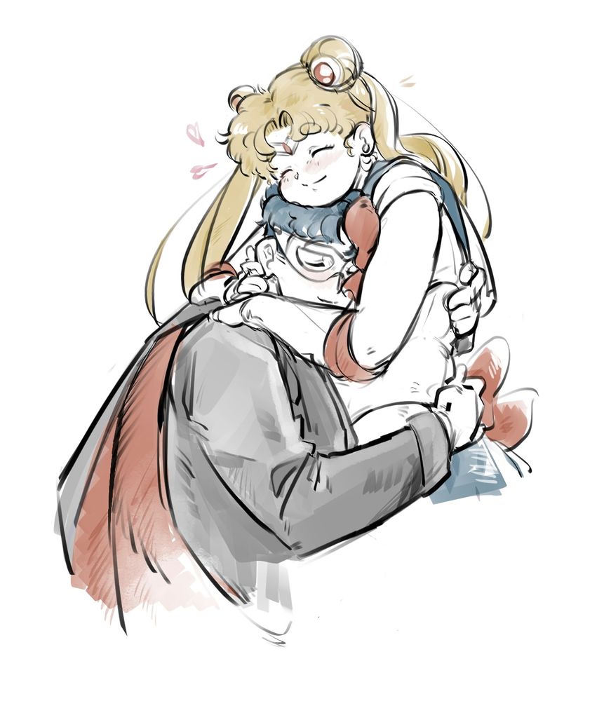 Sailor Moon hugging Tuxedo Mask.