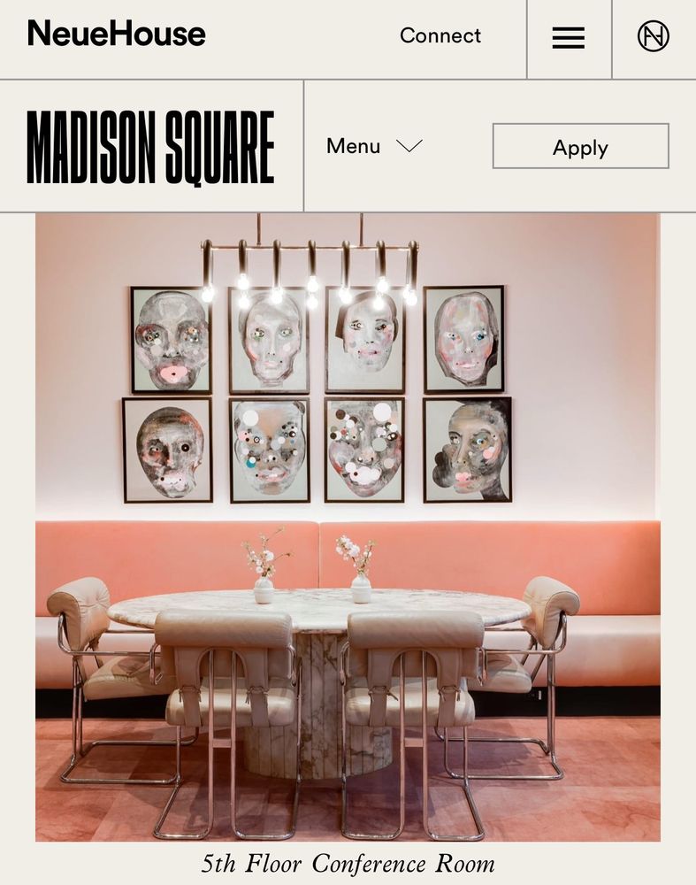 Creepy skull-like portraits over a fancy table.
