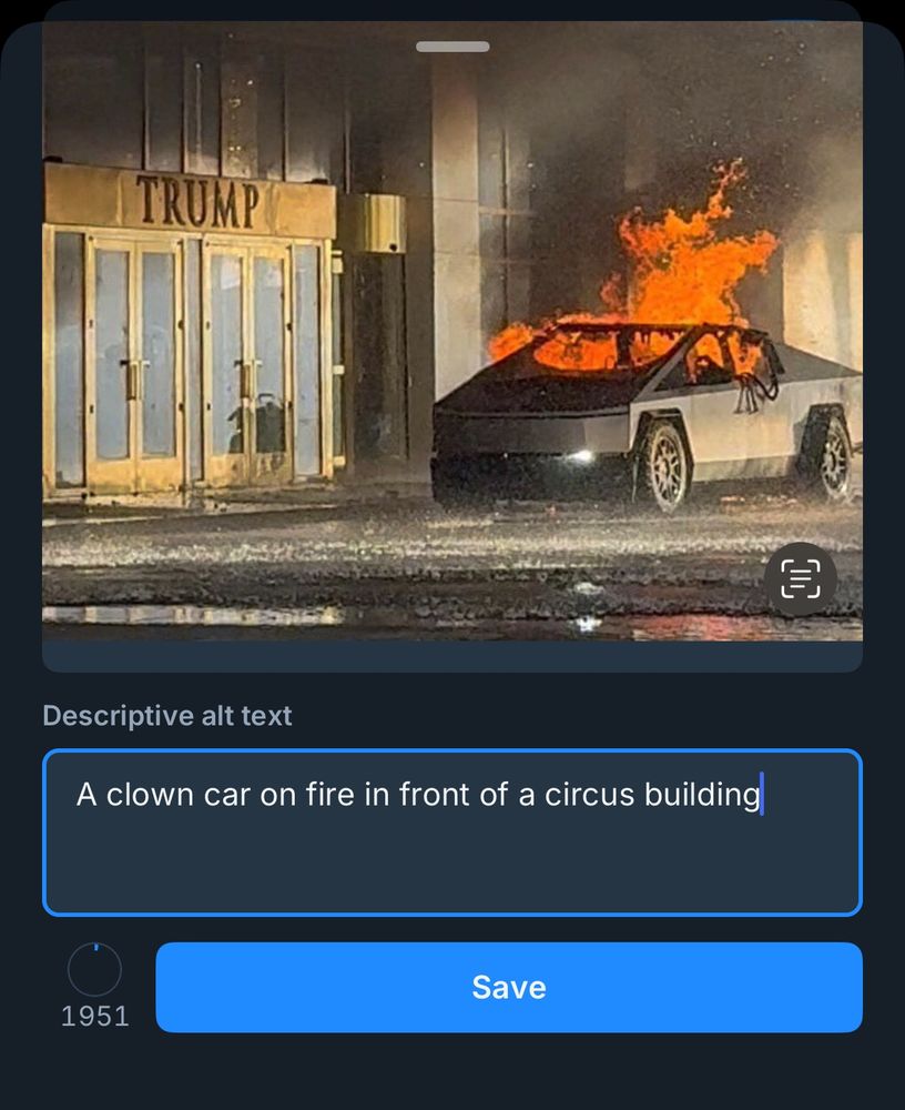 A screenshot of a clown car on fire in front of a circus building