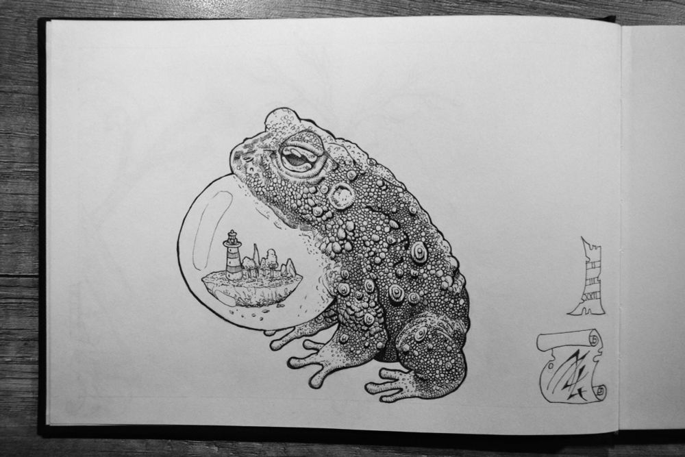 Dessin noir et blanc dans un carnet d'un crapaud gonflant sa gorge dans laquelle flotte une île avec un phare