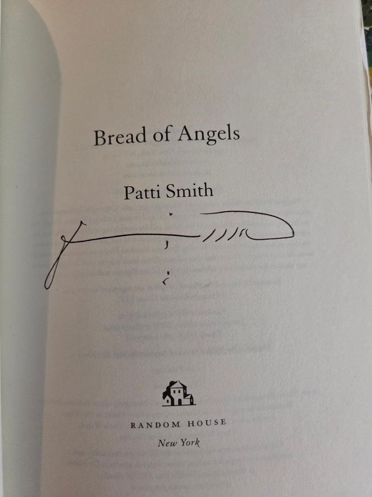 Title page of Patti Smith's book Bread of Angels, signed by the author.