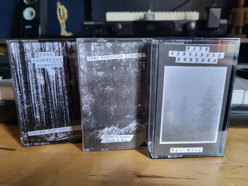 Three Dark Cascadian Forests cassettes