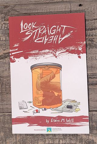 Look Straight Ahead by Elaine M. Will. The cover depicts a young man trapped inside a transparent orange pill bottle, in an uncomfortable position where he's lying on his back with his legs sticking up. Outside the pill bottle there are several pieces of paper, art supplies, and a sketchbook strewn about on the ground.
