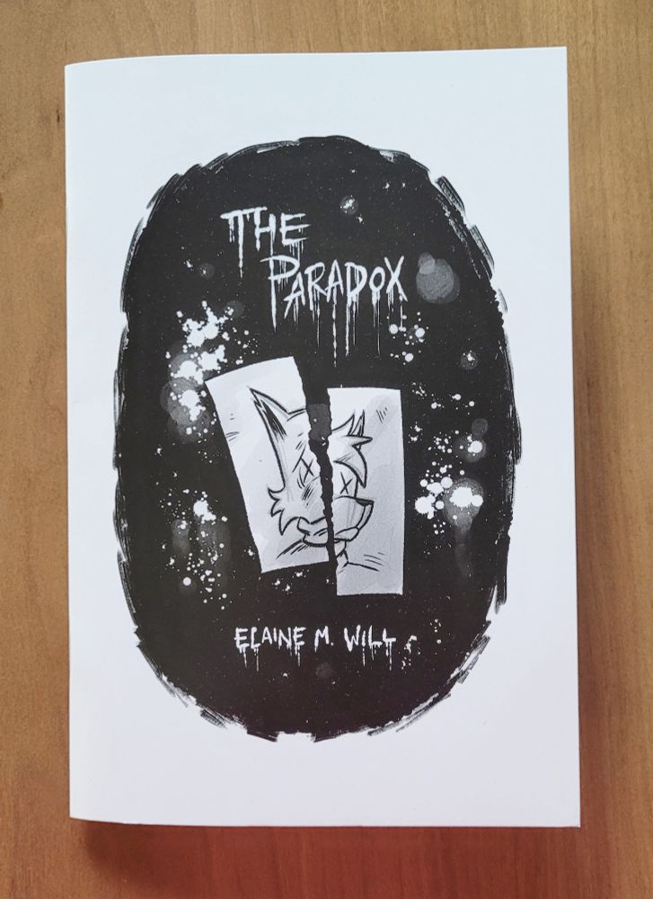"The Paradox," a comic by Elaine M. Will. The cover art depicts a drawing of an anthropomorphic cat character with X-ed out eyes. The drawing is torn in half and the two pieces are misaligned.