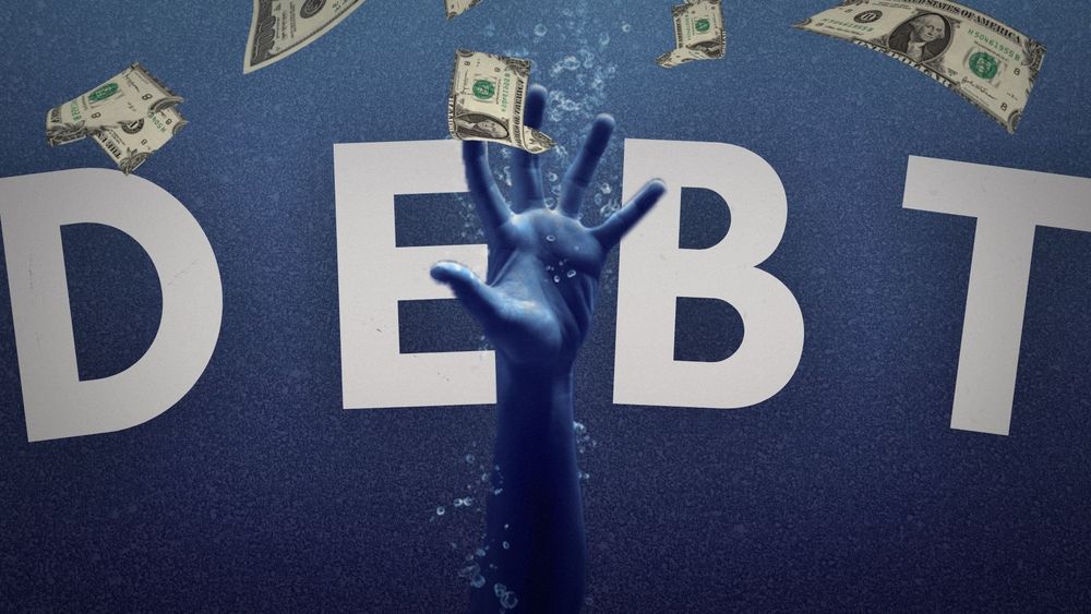 an underwater hand struggles and fails to reach for the surface - and for floating cash. the text reads "debt."