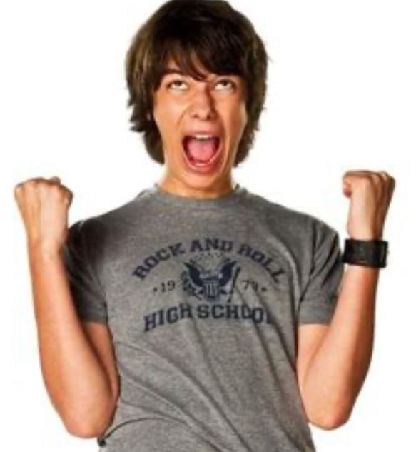 Rodrick yelling in happiness, with both his hands in fists.