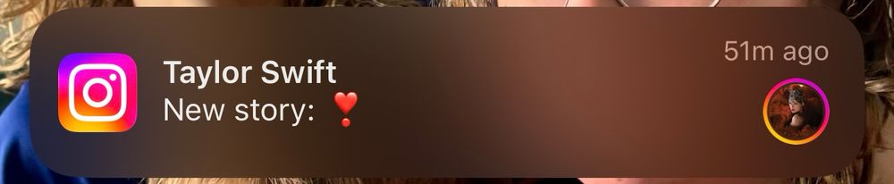 A screenshot of an Instagram notification from Taylor Swift that says “New story: ❣️”