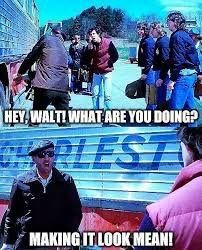 Scene from Slap shot where Walt is beating up the bus. Text says hey Walt what are you doing? Walt says making it look mean 