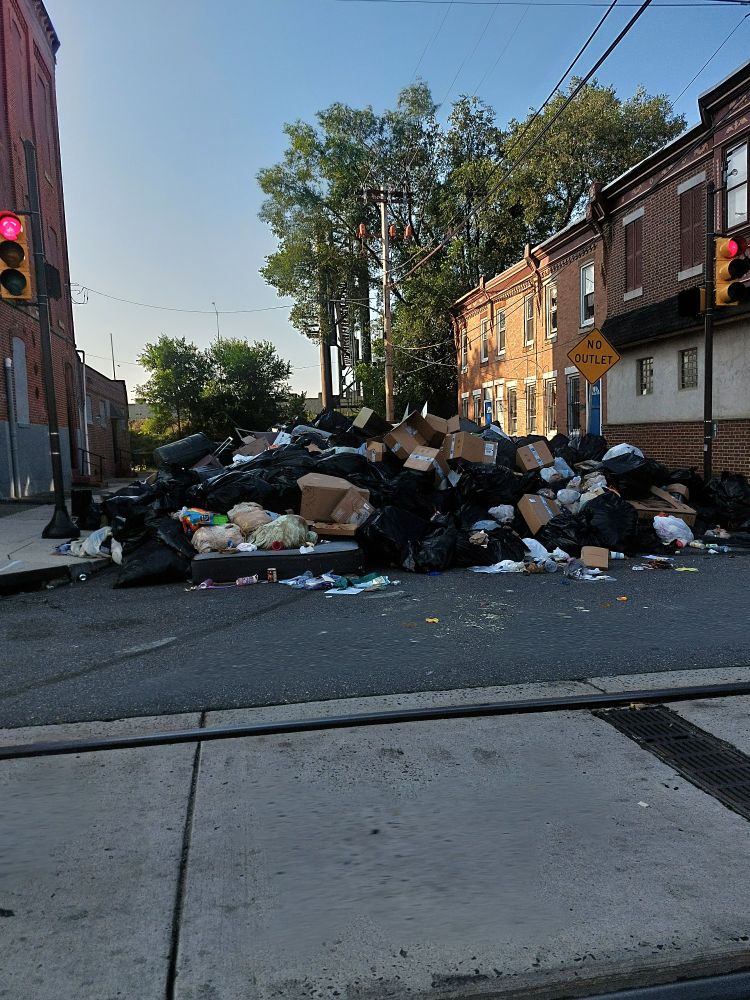 Corner of Richmond & Indiana in Port Richmond where the street has been entirely covered in trash.