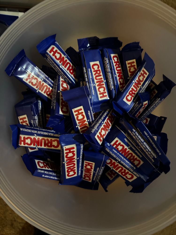 A bin of Nestlé crunch bars.