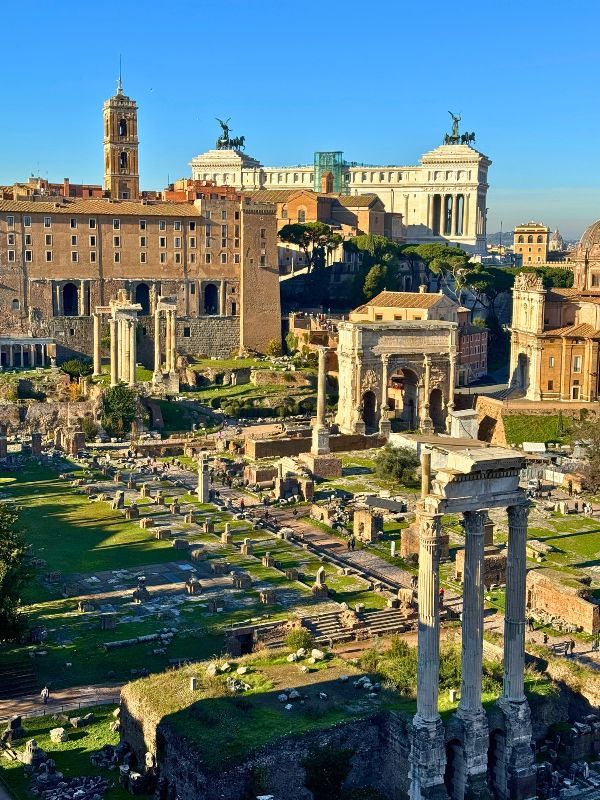 Elevated photo looking down on the pillars of the Roman Forum in Rome, Italy.