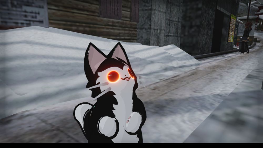 A black and white bipedal cat is looking at the sky expectantly in the winter, waiting for a snowflake to hit its tongue