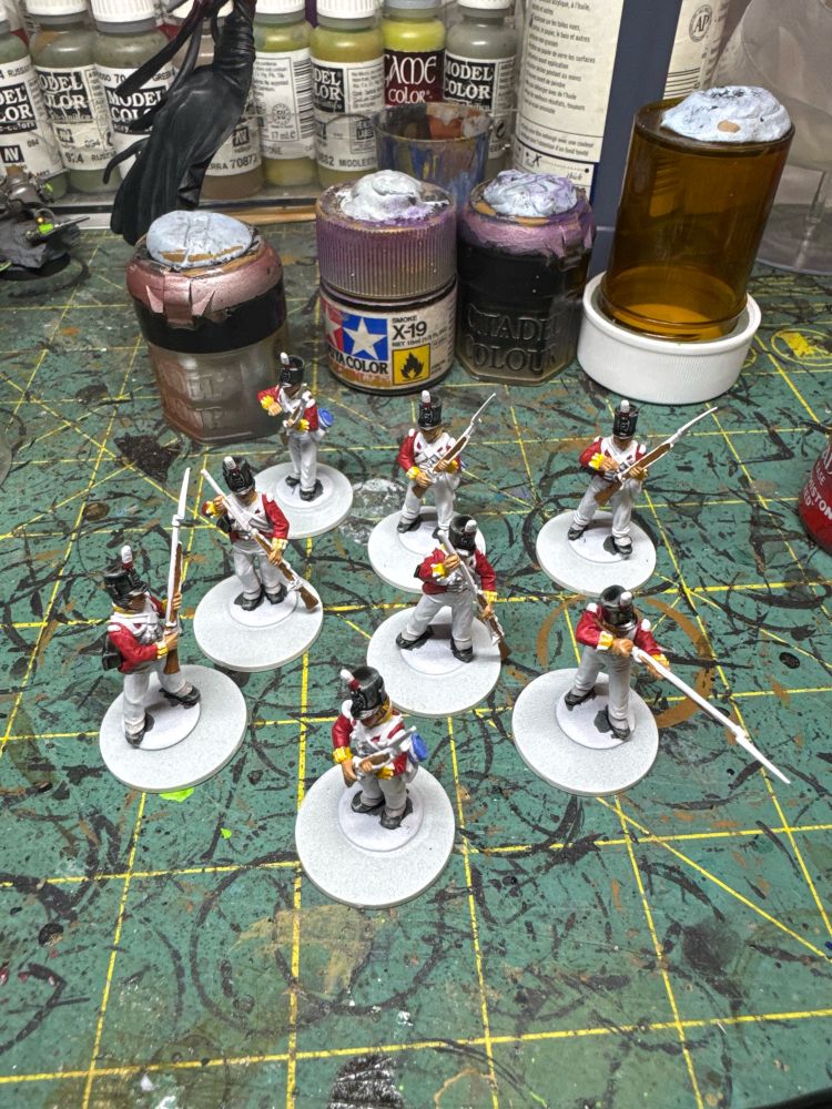 Partially painted Perry British Napoleonic era plastic soldiers. 