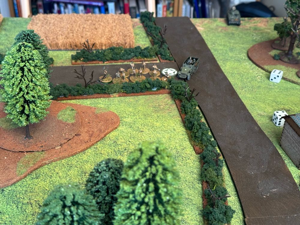 American infantry seize an objective and occupy a hedgerow. 