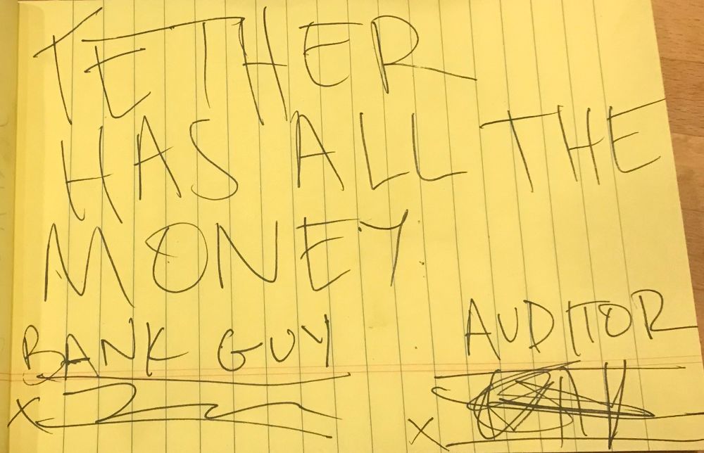 Scribbled note that says

“Tether has all the money”

It’s signed by Bank Guy and Auditor