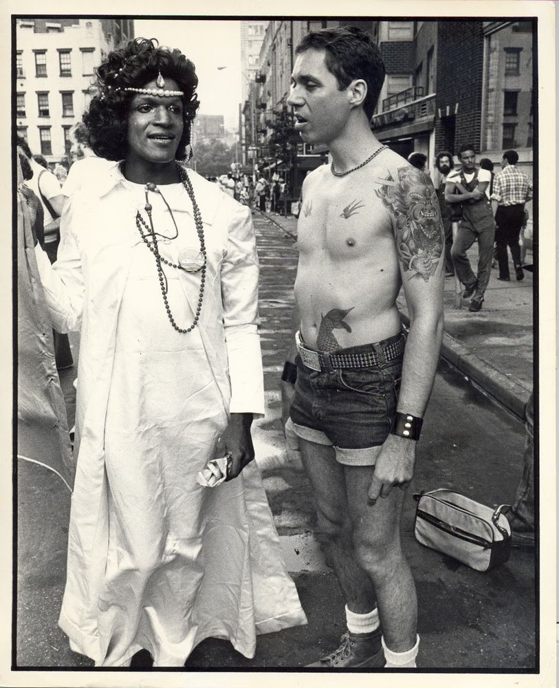Image of Marsha P. Johnson & (unknown) at the Pride March, 1975