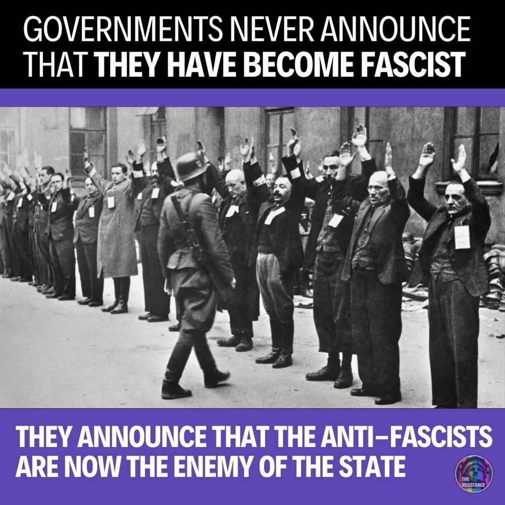 GOVERNMENTS NEVER ANNOUNCE THAT THEY HAVE BECOME FASCIST
THEY ANNOUNCE THAT THE ANTI-FASCISTS ARE NOW THE ENEMY OF THE STATE

Picture of a Nazi lining people up their hands are raised. You can also see tags that they used to label people. The people in this World War II photo are probably Jewish.

