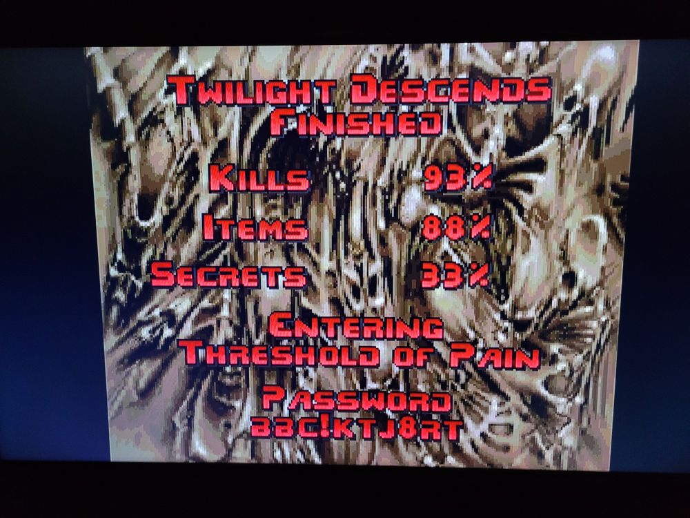 A screenshot of a mission complete screen from doom on playstation one