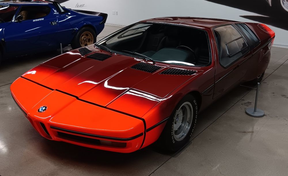 1972 BMW Turbo concept. The car is dark red while the front and rear are a lighter shade of red.
