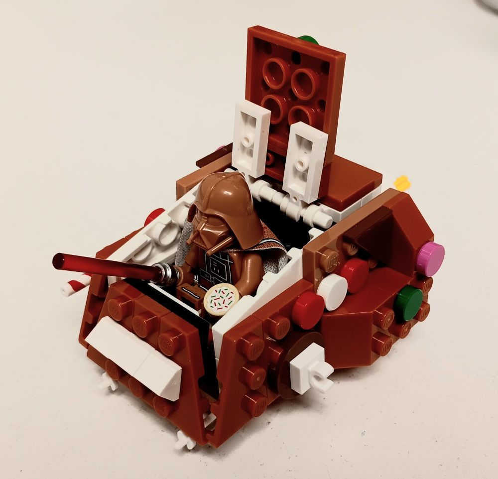 Top hatch open with Vader sitting inside. It's too small so Vader sticks out.