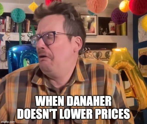 John Green making a disgusted face with P4A balloons in the background with the text When Danaher Doesn't Lower prices