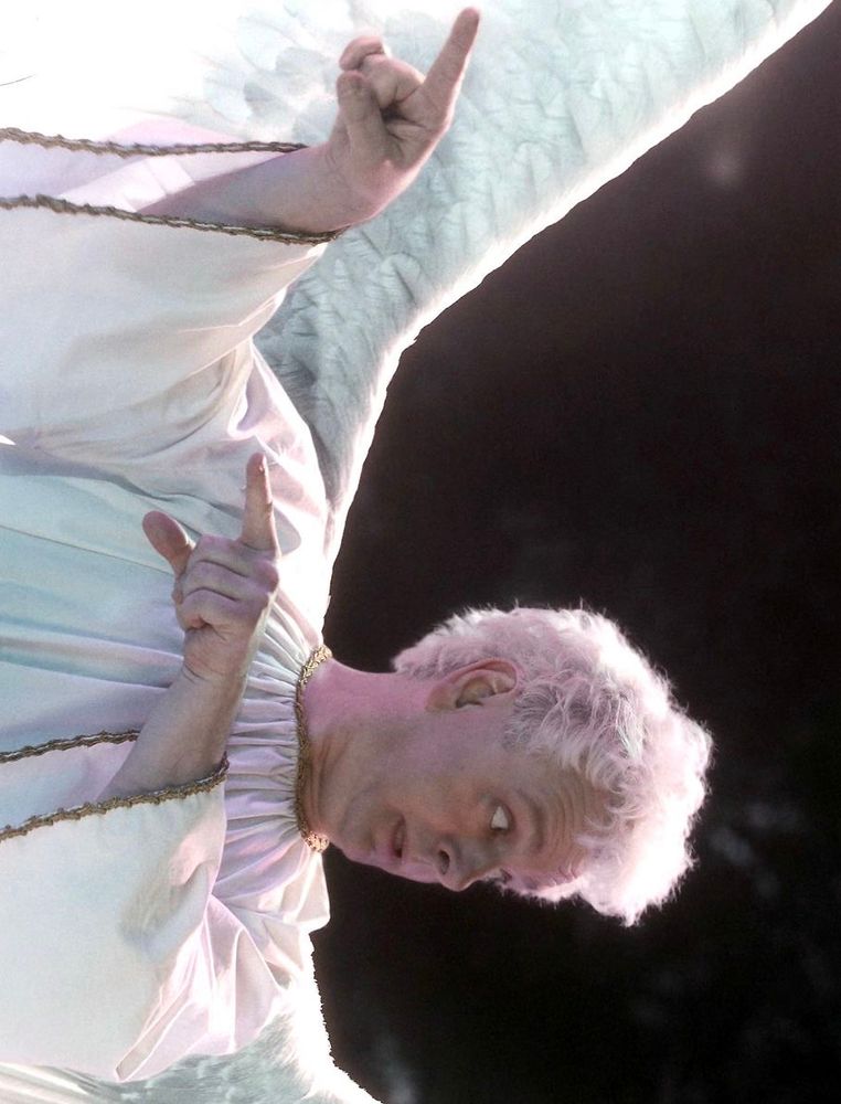 Michael Sheen as Aziraphale (Good Omens) pointing sideways…. The image is tilted, so it points up. 