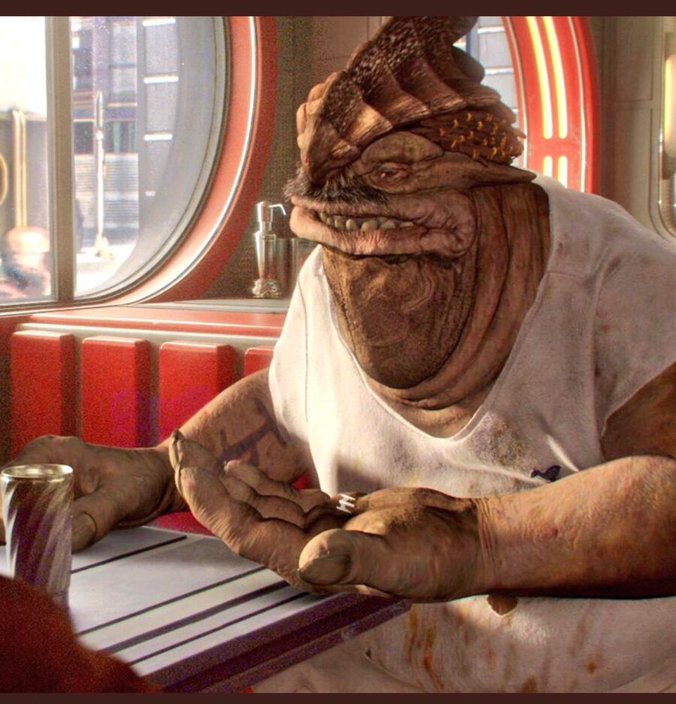 Dexter Jettster talking to Obi-Wan about the dart in Star Wars Episode 2: Attack of the Clones.
