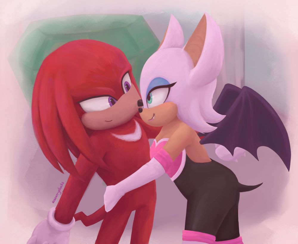 knuckles and rouge hugging and looking at each other in front of the master emerald 