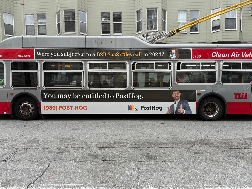 Bus ad for a startup called "PostHog"