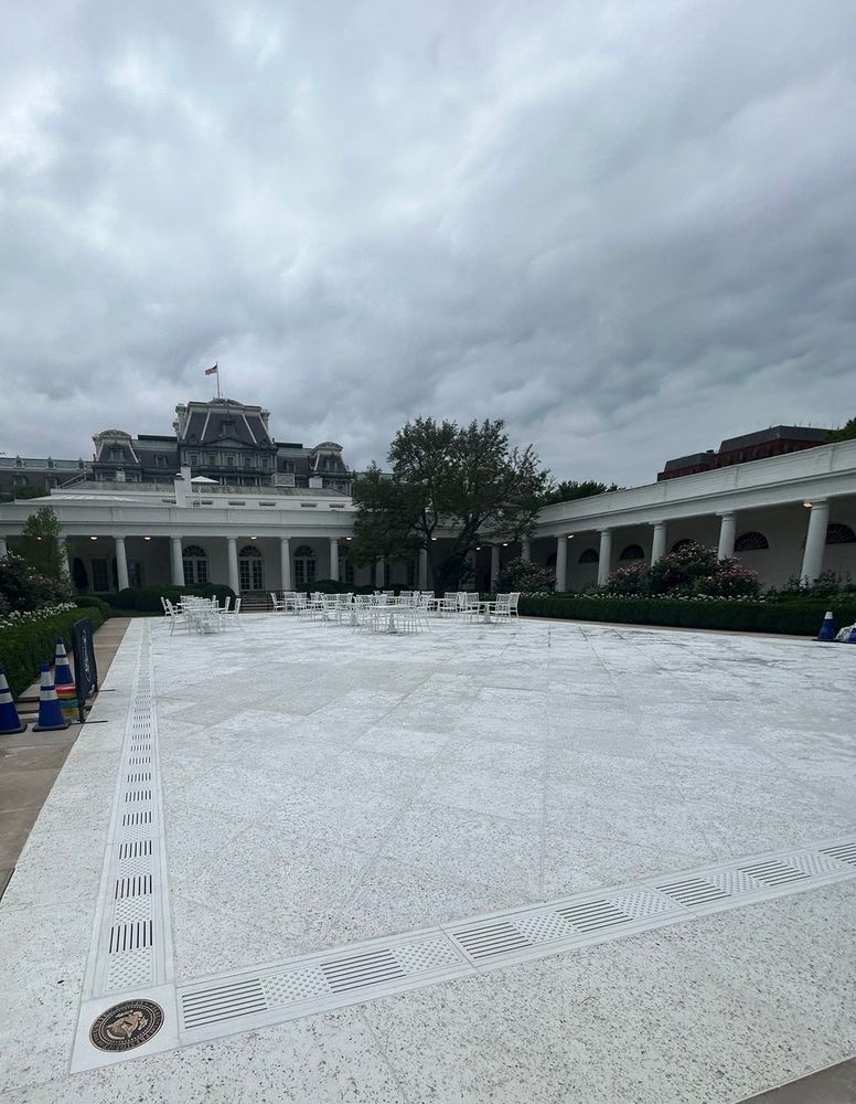 Massive white patio with the White House in the background