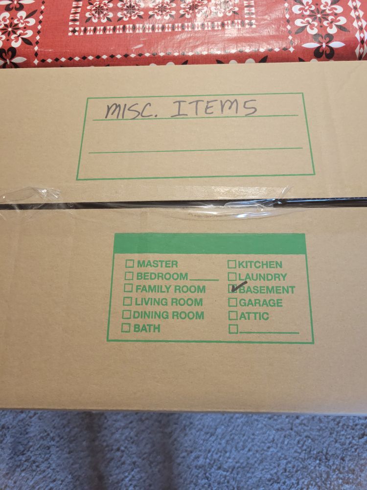 Moving box labeled Misc. Items. 