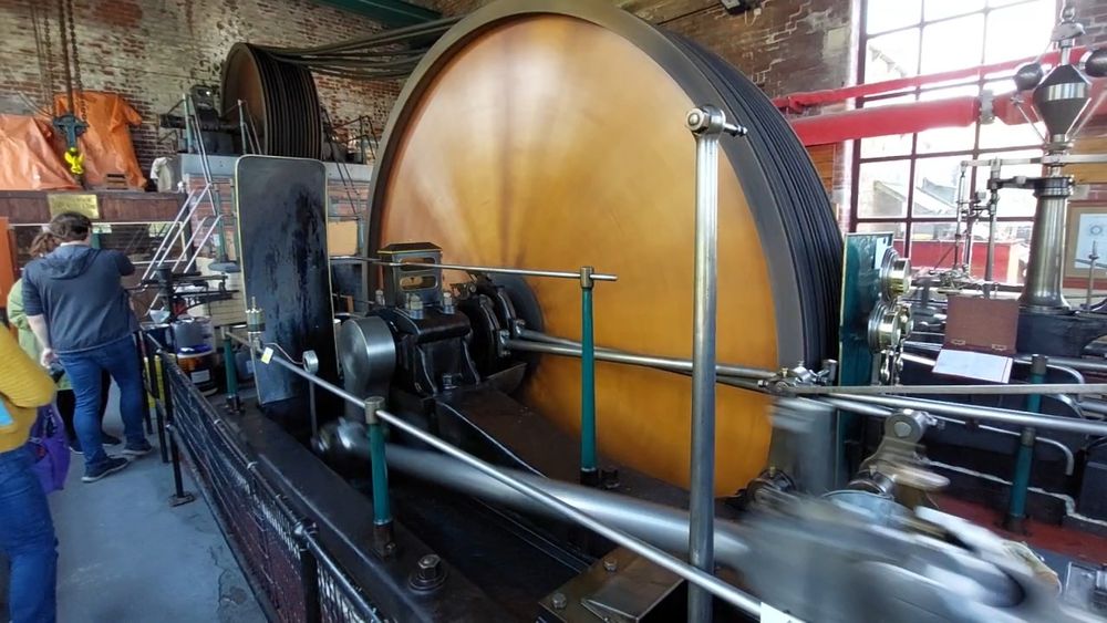 Large mill flywheel and pulley, part of the Bancroft mill engine