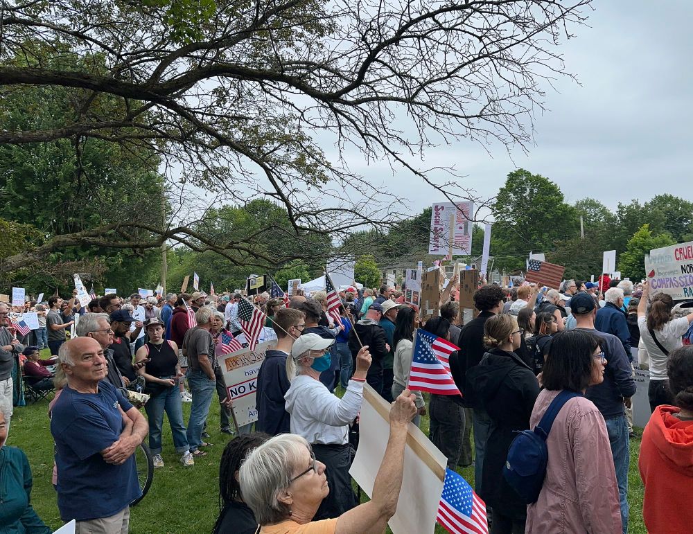 Large crowd with signs