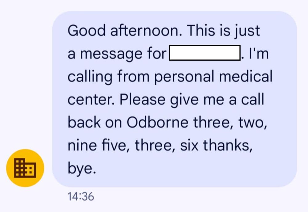A text message from a voicemail that reads "Good afternoon. This is just a message for [name redacted]. I'm calling from personal medical center. Please give me a call on Odborne three, two, nine five, three, six thanks, bye."
