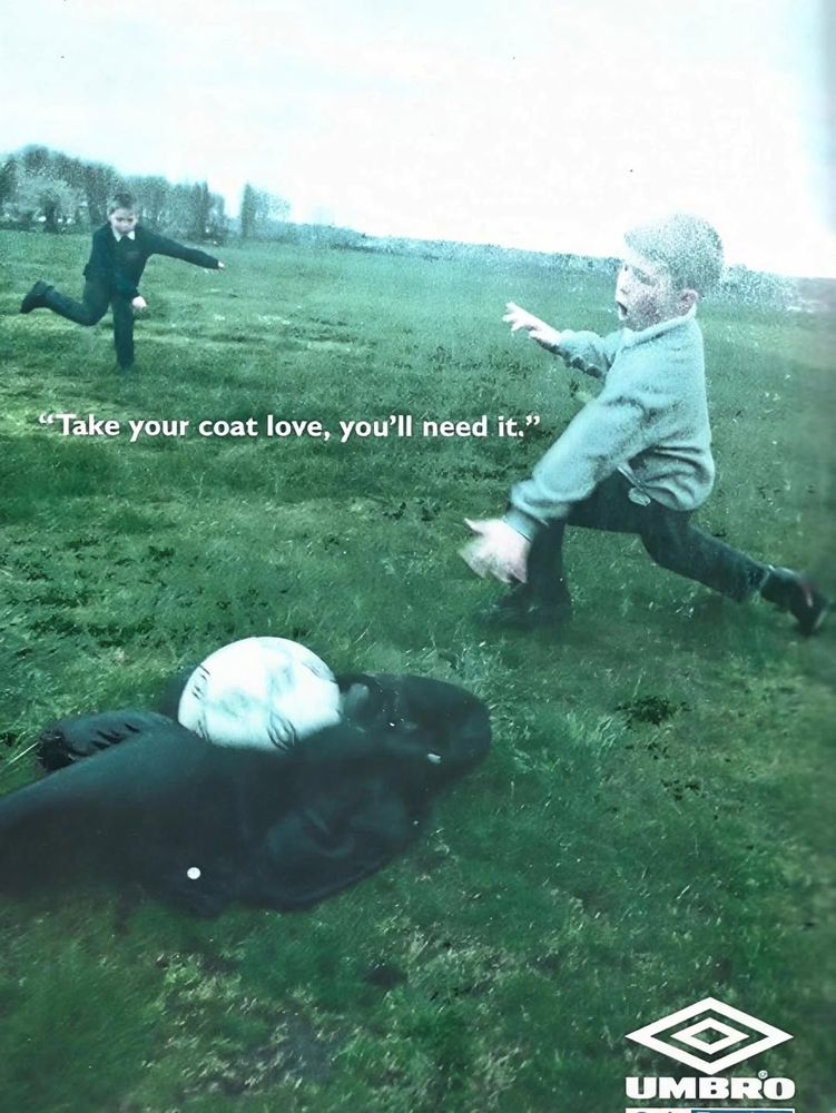Caption says: "Take you coat love, you'll need it." Image is the coat being used as a goalpost with one kid shooting past another in goal - the ball over the sprawled coat surely to become a source of extended debate imminently.