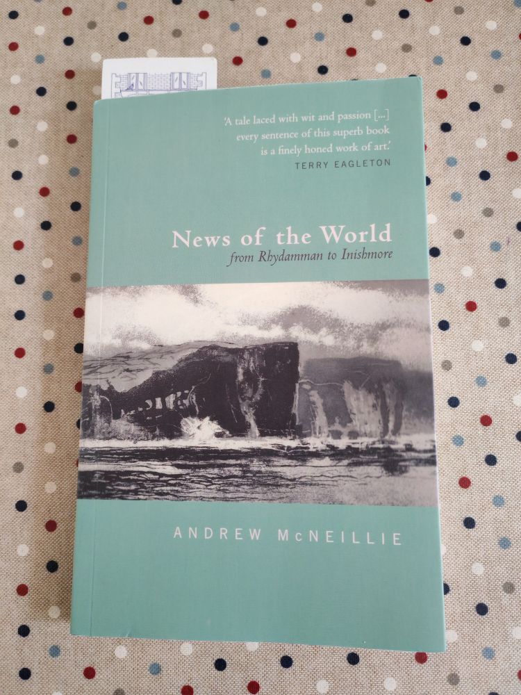 Teal cover with black and white island photo (an etching by Norman Ackroyd is my guess).