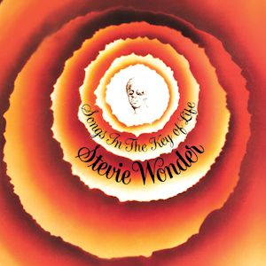 Cover picture of the album Songs in the Key of Life by Stevie Wonder shows picture of Stevie Wonders in the center of orange and white circles.