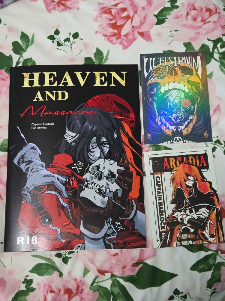 A Captain Harlock doujinshi with two small Harlock prints.