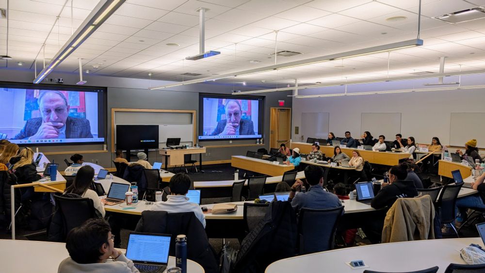Cyrus Mehri speaks to a classroom full of MBA students enrolled in the Equity Analytics course at Michigan's Ross School of Business.