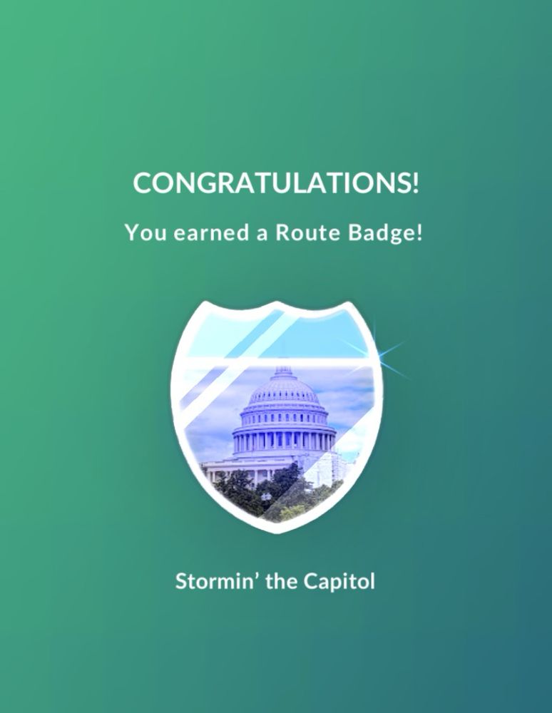 pokémon go screen shot that says “Congratulations! You earned a route badge! storming’ the capitol”